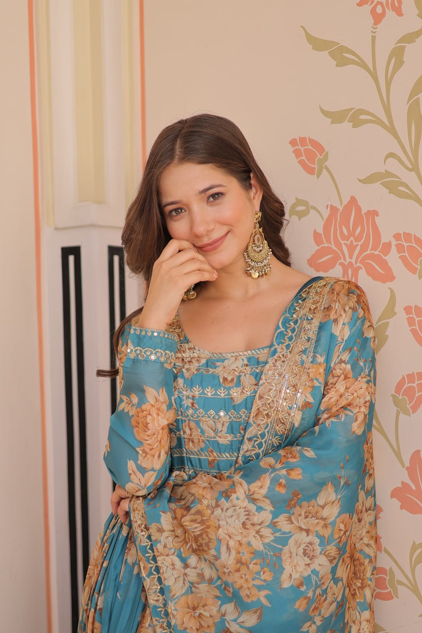 Woman wearing teal Russian silk embroidered gown with floral print and dupatta – TFY Ethnic.