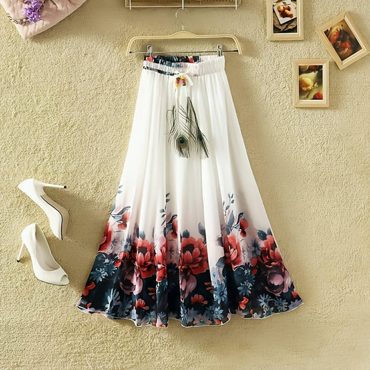 A floral print silk skirt in white, blue, and red, with a button and fancy dori work, displayed on a hanger.