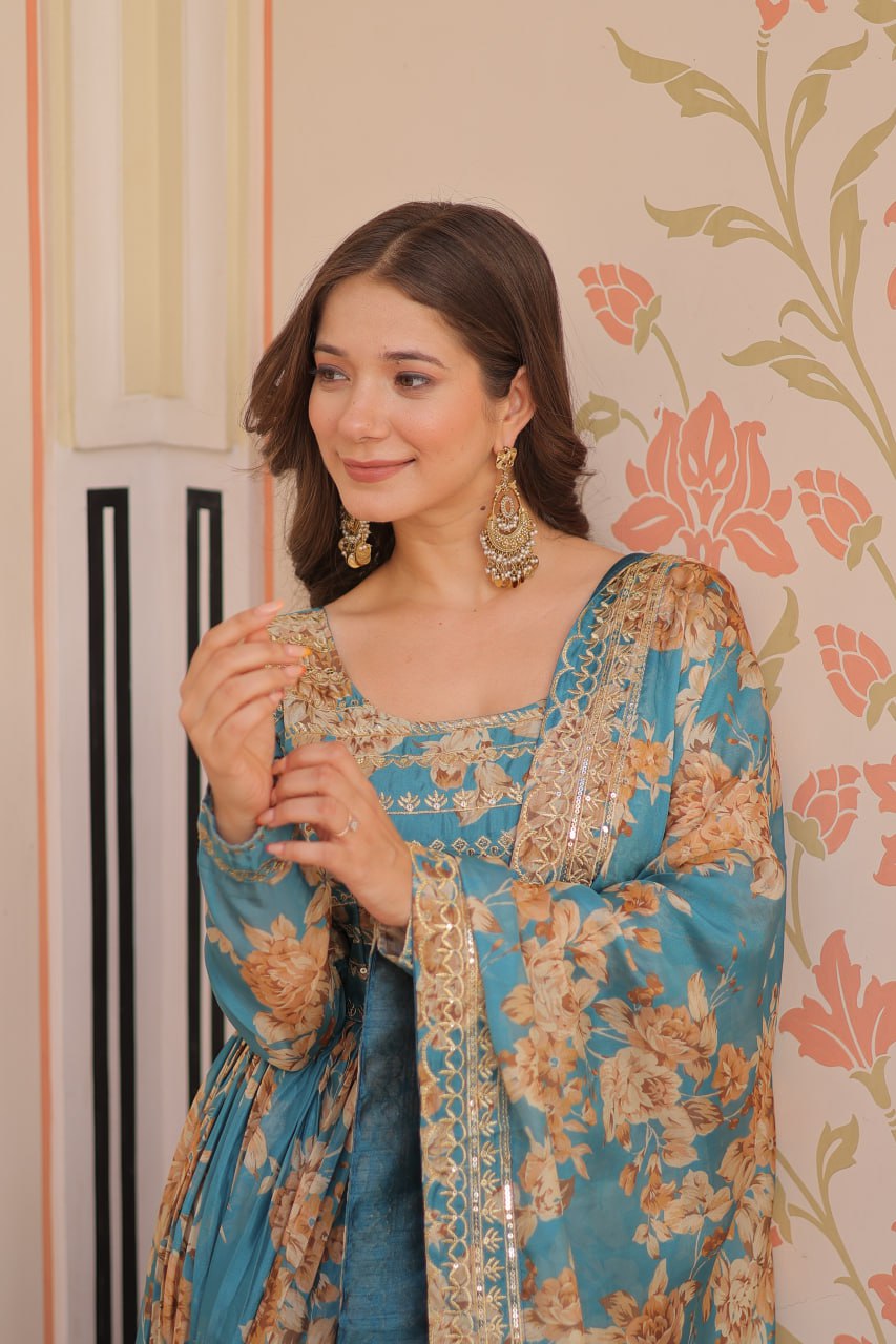 Woman wearing teal Russian silk embroidered gown with floral print and dupatta – TFY Ethnic.