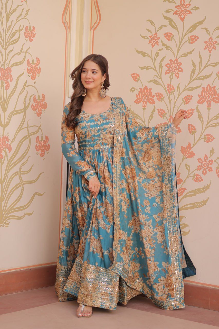 Woman wearing teal Russian silk embroidered gown with floral print and dupatta – TFY Ethnic.
