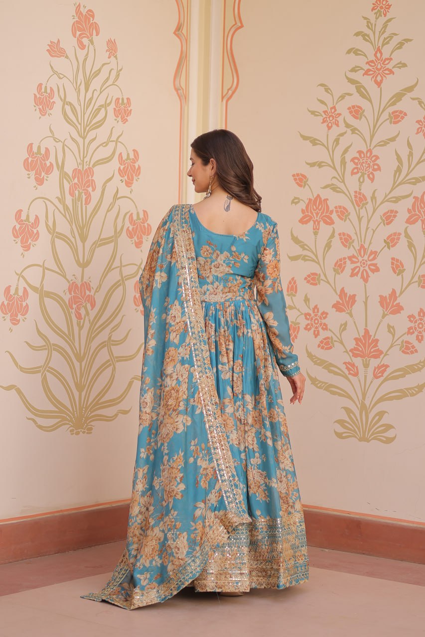 Woman wearing teal Russian silk embroidered gown with floral print and dupatta – TFY Ethnic.